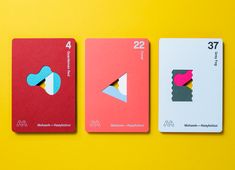 three cards with different shapes and numbers on them