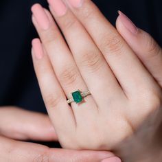 Product Details This mesmerizing Solitaire Engagement Ring showcases an Octagon shape Emerald set as Solitaire in 4 Prong Setting while dainty Round shape diamonds dance down the band. This Emerald Ring is a perfect choice for you to style with your special attires and to stand out from the crowd at any special event. Product Information SKU SHP-RINGS032012832 Width 5.2 mm Height 7 mm Weight 2.02 gm (Approximate) EMERALD INFORMATION No.of Stones 1 Pieces Total Weight 1.21 Carat (Approximate) Dim