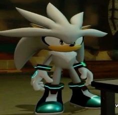 the sonic character is standing in front of a table