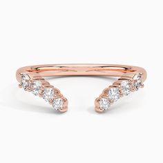 Lior Diamond Open Wedding Ring - 14K Rose Gold. Shimmering diamonds gently taper in size across half of this design while the open edges leave space so it can fit perfectly with an engagement ring (1/4 total carat weight). Rose Gold Open Band Diamond Ring, Elegant Rose Gold Open Band Wedding Ring, Rose Gold Open Band Diamond Ring For Promise, Rose Gold Open Band Diamond Promise Ring, Rose Gold Open Band Promise Ring, Rose Gold Open Band For Anniversary, Rose Gold Open Band For Wedding And Anniversary, Rose Gold Open Diamond Ring With Prong Setting, Rose Gold Open Band Diamond Ring For Anniversary