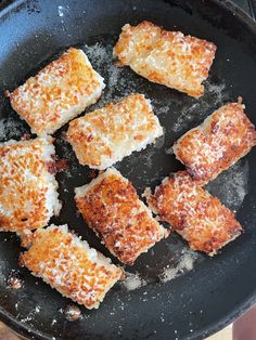 some food is being cooked in a pan on the stove and ready to be eaten