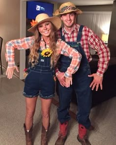 a man and woman dressed up in cowboy outfits