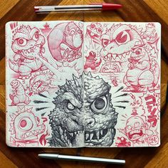 a notebook with some drawings on it