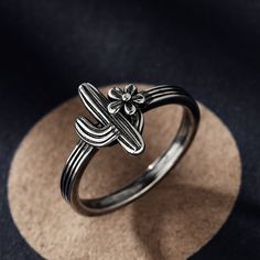 Weight: 2.5 gWidth: 2.1 mmHeight: 3 mmThickness: 1.2 mmMaterial: Plating Color: Desert Cactus, Cactus Flower, Sterling Silver Ring, Silver Ring, Sterling Silver Rings, Bespoke, Cactus, Silver Rings, Custom Design