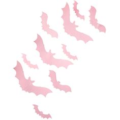 pink bats flying in the air on a white background