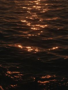 the sun shines brightly in the water as it reflects off the surface of the ocean