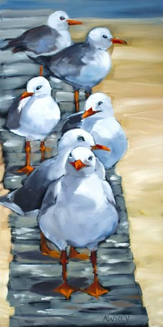 a painting of seagulls standing on the beach