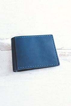 Our newest bifold leather wallet, handmade in our studio, features four card slots (two inside, two outside) and a billfold pocket. This slim design can fit up to 10+ cards and cash comfortably. This durable buffalo calf leather has a smooth finish and will gradually darken and patina beautifully overtime. **Contents** * 100% Genuine Korba Buffalo Calf Leather * Vegetable Tanned * 4 card slots + billfold pocket * Handmade **Care/Import** * Made in the USA **Dimensions** * Measures approximately Leather Bifold Wallet, Natural Tan, Bifold Wallet, Slim Design, Boho Outfits, Wallets For Women, Calf Leather, Leather Wallet, Card Slots