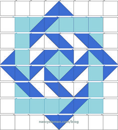 a blue and white quilt pattern with squares in the middle