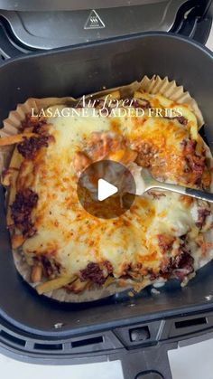 the lasagna is loaded and ready to be cooked in the grilling pan