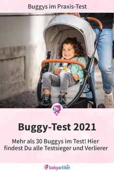 a woman pushing a stroller with a child in it and the words buggy test on