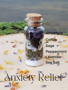 Anxiety relief spell jar photo with labels of what is inside- amethyst, coffee, sage, peppermint, Lavender, sea salt Clear Quartz Spell Jar, Basic Spell Jars, Wich Craft Spells Jar, Herbs For Spell Jars, Emotional Protection Spell Jar, Herbs In A Jar, Spell Jar For Beauty, Spell Jar Wax Color Meaning, Insight Spell Jar