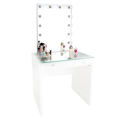 a white vanity table with a lighted mirror and various makeup products sitting on top of it