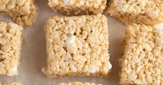 several squares of rice krispy treats with white frosting