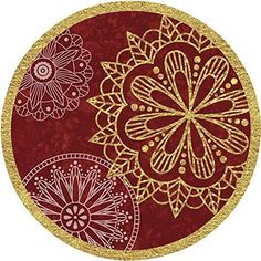 a red and gold plate sitting on top of a white tablecloth covered in doily