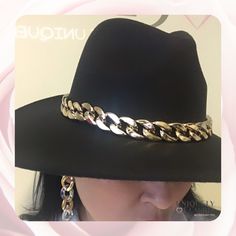 The very stunning Dakota Chain Band Hat is the perfect classy, trending and an absolute must have! The unique curb gold chain accent cowboy hat will surely turn heads! Adding this one-size hat to any outfit can give it just the kind of kick it may need! The chain above the brim adds a special and stylish touch. The soft wool material is desirable without any uncomfortable itch. Pair with a flowy dress, sandals and sunglasses in the summer. Accessorize with over the knee boots and a cardigan for Hat Band, Cowboy Hat, Dress Sandals, Flowy Dress, Soft Wool, Over The Knee Boots, Over The Knee, Gold Chain, Hats For Women