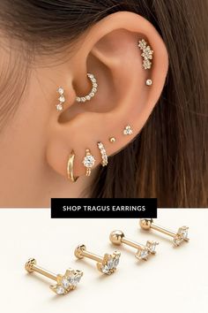 three pairs of ear piercings with crystal stones on each side and the same one in gold