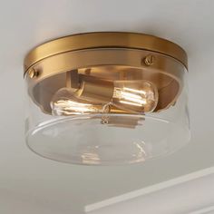 a close up of a light fixture on a ceiling