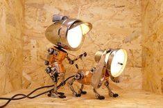 two robot lamps are connected to each other