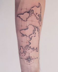 a man's arm with a map tattoo on it