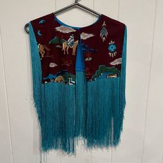 Vintage Native American Handmade Fringe Vest Top Brand: I Believe It Was Handmade Vintage And Or Pre-Owned Condition Could Be General Wear Over Time Size: I Would Say Fits Like A Women's Small? Although Its Probably Generous Since If You Choose To Leave It Open Sizing May Vary Especially With Vintage Items So Please See Measurements Below Carefully: Pit To Pit 15ish Length From Shoulder Down 22” Ish Vintage Vest For Festivals, Vintage Blue Denim Vest For Festivals, Vintage Fringed Winter Outerwear, Vintage Western Leather Vest, Vintage Brown Fringed Outerwear, Fringe Vest, Vintage Jacket, Vest Top, Native American