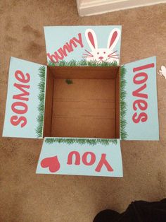 a cardboard box that has been cut out to look like an easter bunny with words on it