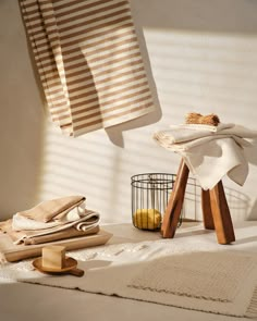 towels and other items on a table in a room