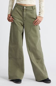 Made from stretchy twill, these full-length pants are right on trend with workwear-inspired details like paneled legs, a carpenter loop and slight fading. 31" inseam; 26" leg opening; 12 1/2" front rise; 15 1/2" back rise (size 8) Zip fly with button closure Side-seam pockets; back patch pockets 97% cotton, 3% spandex Machine wash, tumble dry Imported Not available for sale and shipment to Germany Carpenter Pants, Cargo Pant, Clothing Dresses, Dream Wardrobe, Denim Pants, Not Available, Mid Rise, Work Wear, Full Length