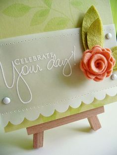 a close up of a card with a flower on it