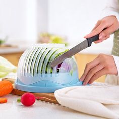 a person cutting up vegetables with a knife