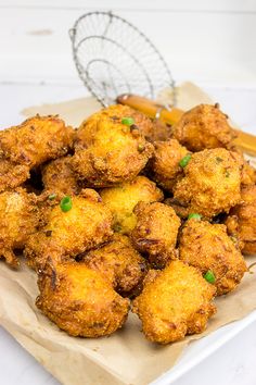 some fried food is on a white plate