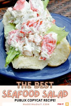 the best seafood salad recipe on a blue plate