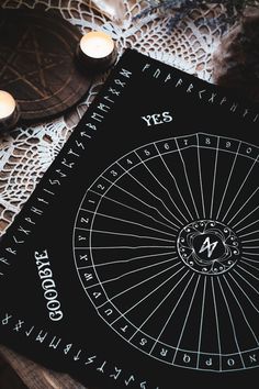 an astro wheel with candles on top of it next to some other items that are laying around