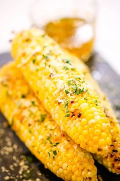 grilled corn on the cob with garlic and parmesan is an easy side dish