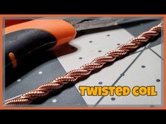 the twisted coil is being worked on with scissors