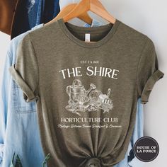 The Shire Garden Shirt the Hobbit Elevenses Shirt Lord of - Etsy The Hobbit Merchandise, Hobbit Cricut, Lotr Tshirt, Hobbit Aesthetic Home, Shire Garden, Hobbit Shirt, Hobbit Outfit, Hobbit Decor, Lord Of The Rings Gifts