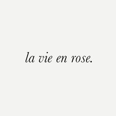 the word la vie en rose written in black ink