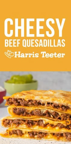 three cheesey beef quesadillas stacked on top of each other with jalapenos in the background