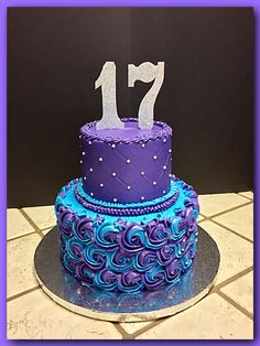 a purple and blue cake with the number 17 on it