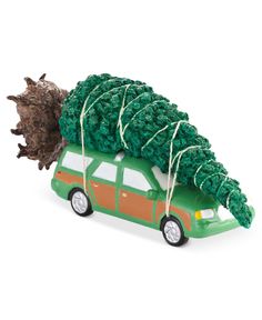 a toy car with a christmas tree on top