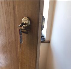 an open door with a key in it