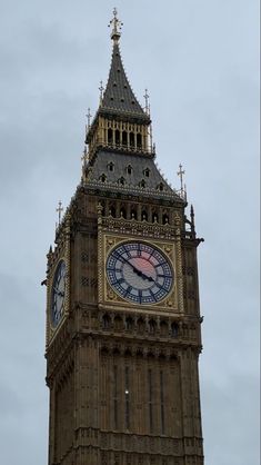 the big ben clock tower towering over the city of london