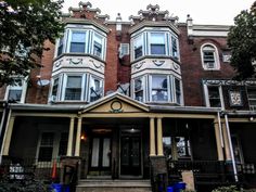 an apartment building with many windows and balconies