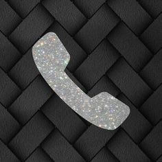 an image of a phone with glitter on the front and back side, in black background