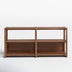 a wooden shelf with two shelves on each side