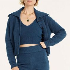 J Crew NWT $128 Collared Cotton Bouclé Cardigan Sweater in Blue | Sz 2X Color: Deep Midnight Product Details This one's for all the warm and fuzzies... Our new cotton-blend bouclé is soft, stretchy and, of course, fuzzy. Here, we crafted it into a retro collared cardigan. And because some things are just better together, we made a matching tank and shorts for a new take on the sweater set. Plus, it was made at a Fair Trade Certified™ factory that provides additional income and better conditions Winter Loungewear Button-up Cardigan, Winter Sweater With Buttons For Loungewear, Blue Winter Cardigan For Loungewear, Blue Knit Outerwear For Loungewear, Fitted Cozy Blue Outerwear, Fitted Blue Cozy Outerwear, Blue Fitted Warm Outerwear, Cozy Blue Fitted Outerwear, Collared Cardigan