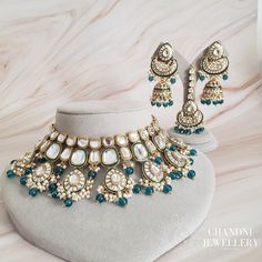 The Moskin Necklace Set is a stunning display of kundan, accented with colorful beads. This set includes matching earrings and tikka for a complete look. The necklace has an adjustable dori (cord) to fit all neck sizes. Measurements: Necklace Set: Length: 18cm / Width: 6cm approx. Earrings: Length: 8cm / Width: 4.5cm approx. Tikka: Length: 5cm / Width: 4cm approx. Hand Accessories, Oxidised Jewellery, Bridal Jewelry Sets, Kids Jewelry, Bridal Sets, Matching Earrings, Necklace Set, The Necklace