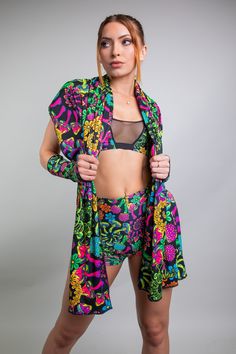 Add a pop of psychedelic fun to your festival look with the PsyBloom Festival Scarf. Featuring a trippy mushroom print, this scarf is perfect for keeping you warm and stylish throughout the music-filled days and nights. Get ready to stand out in the crowd with this playful and unique accessory.   Product Details    Bloomin' Shroomies 🍄 🌼   FRW's Version of a Pashmina   Soft and Stretchy    90% Polyester 10% Spandex   Handmade in San Diego, CA   Satisfaction Guaranteed    Lifetime Warranty     Due to varying screen display settings, you may see some fabric images brighter or darker than the real fabric. So please consider that tolerance before ordering based on the website images. Trippy Outfits, Festival Scarf, Ruffles Potato Chips, Edc Orlando, Festival Hats, Fabric Images, Trippy Mushroom, Festival Scarves, Festival Inspo