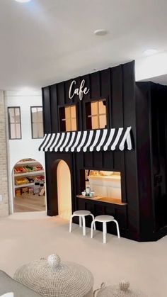 a black and white coffee shop with stools