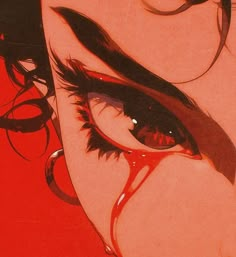 a woman's eye with blood dripping from it